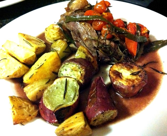 Grilled Lamb Shank with freshly roasted tomatoes and roasted potatoes